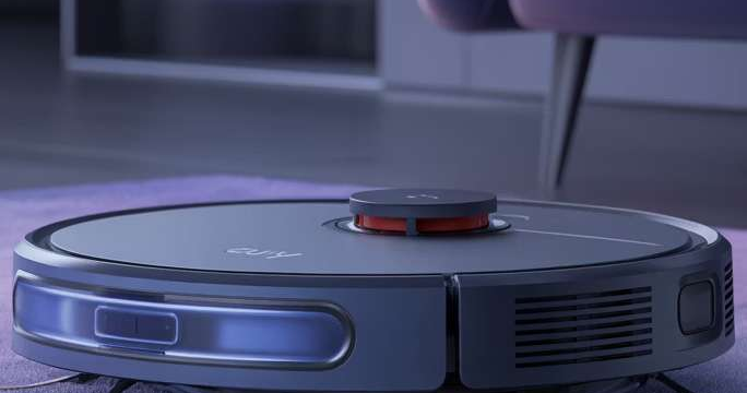Aspirateur robot eufy en démonstration sur un parquet